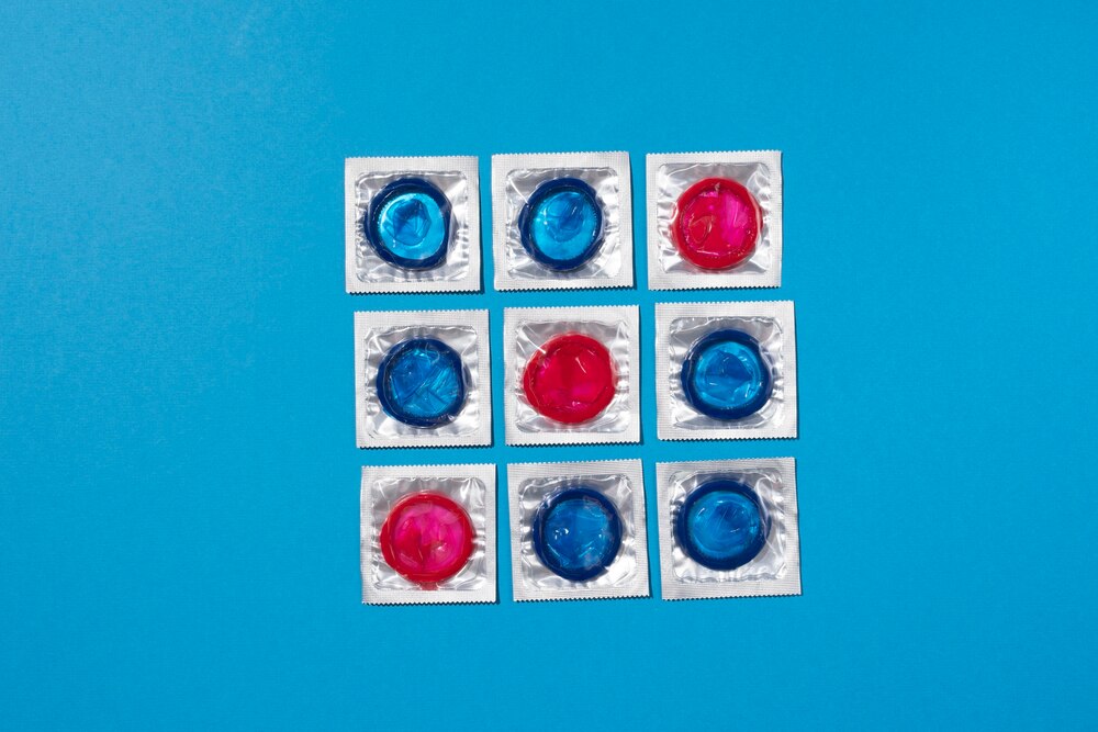 Blue and red condoms arrangement top view
